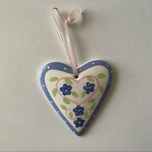 Heart shaped ceramic ornament with blue floral print design